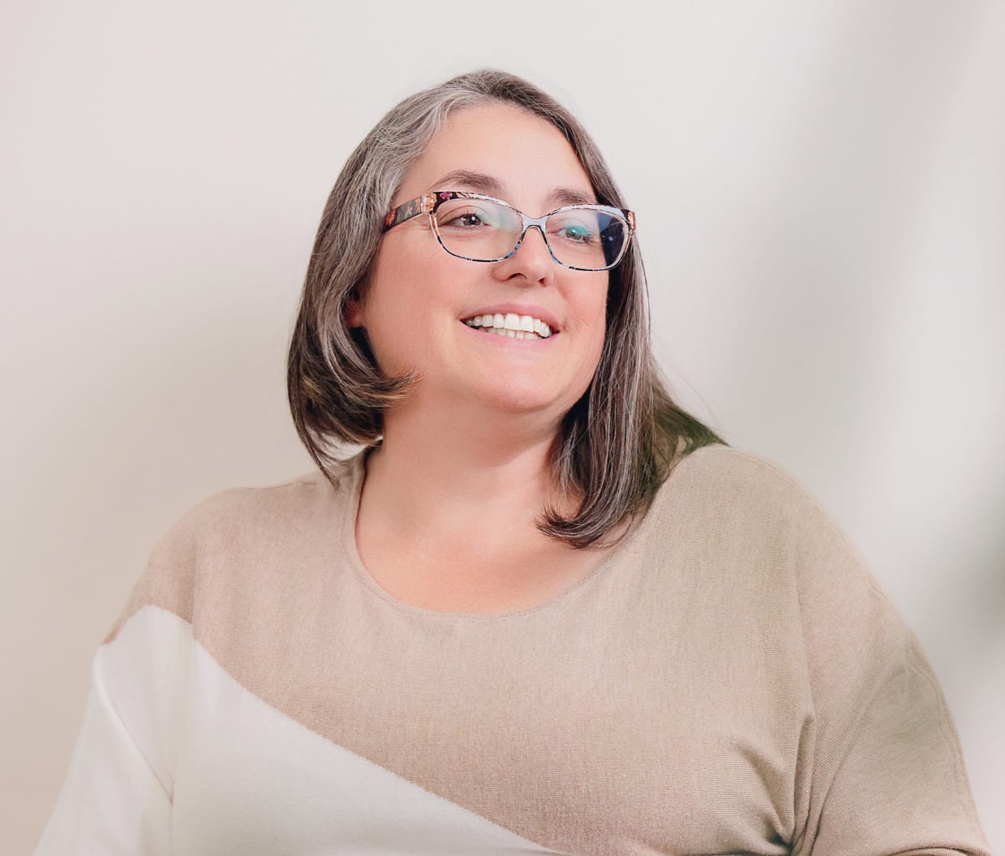 Woman looking to the side and smiling
