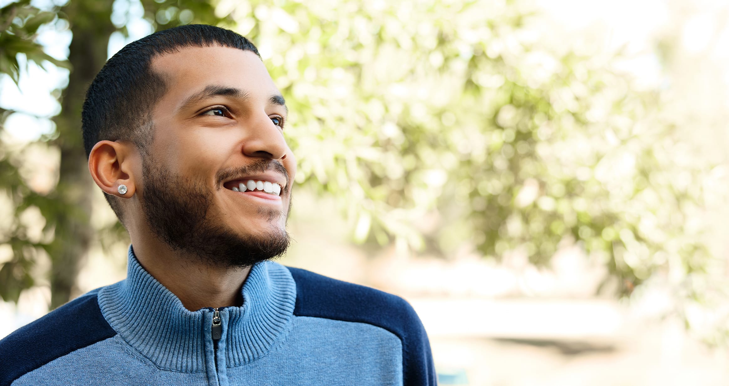 Man smiling outside